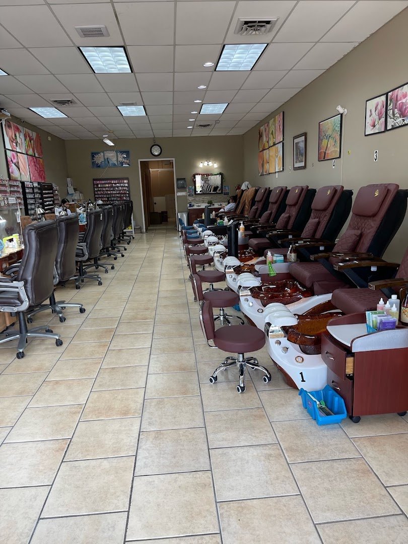 Manicure stations inside a nail salon.